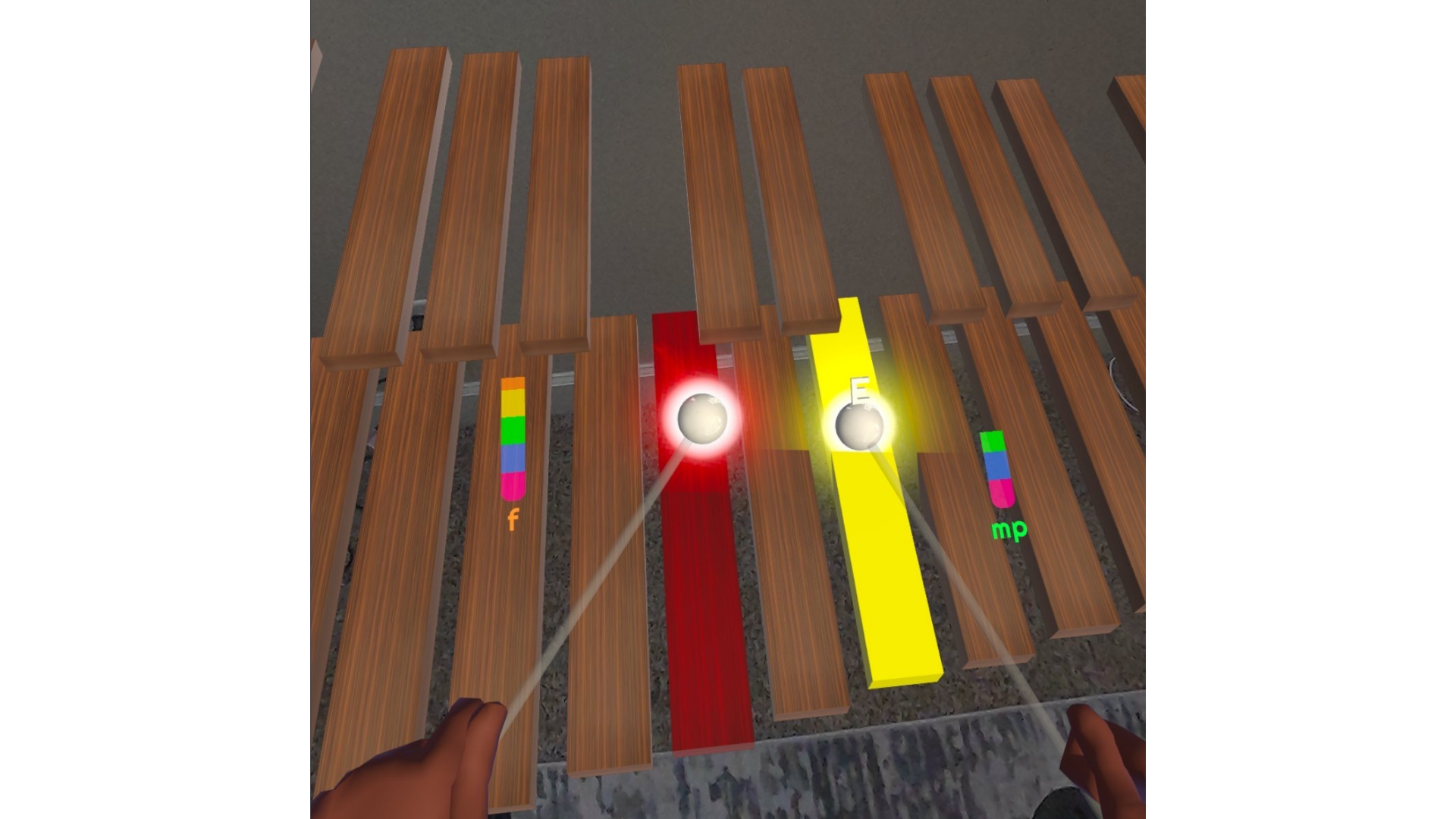 This figure demonstrates the dynamics visual meter attached to each virtual mallet.
